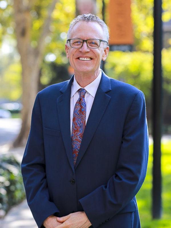 McGeorge School of Law Dean Michael Hunter Schwartz on the quad of the Sacramento campus